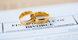 Two cut wedding bands sit on top of divorce papers. Who Gets the House in a Divorce/Dissolution? A guide from SAM Conveyancing Two cut wedding bands sit on top of divorce papers. Who Gets the House in a Divorce/Dissolution? A guide from SAM Conveyancing