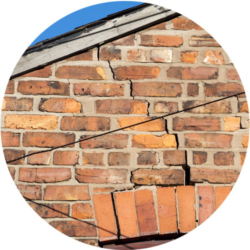 Crack in outside wall above window flagged in a Home Building Survey