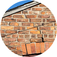 Crack in outside wall above window flagged in a Home Building Survey