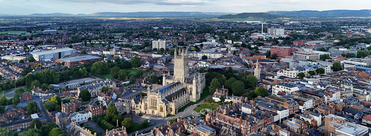 Aerial view of Gloucester Cathedral in Gloucestershire, in southwestern England. SAM Conveyancing's analysis of the Gloucestershire property market